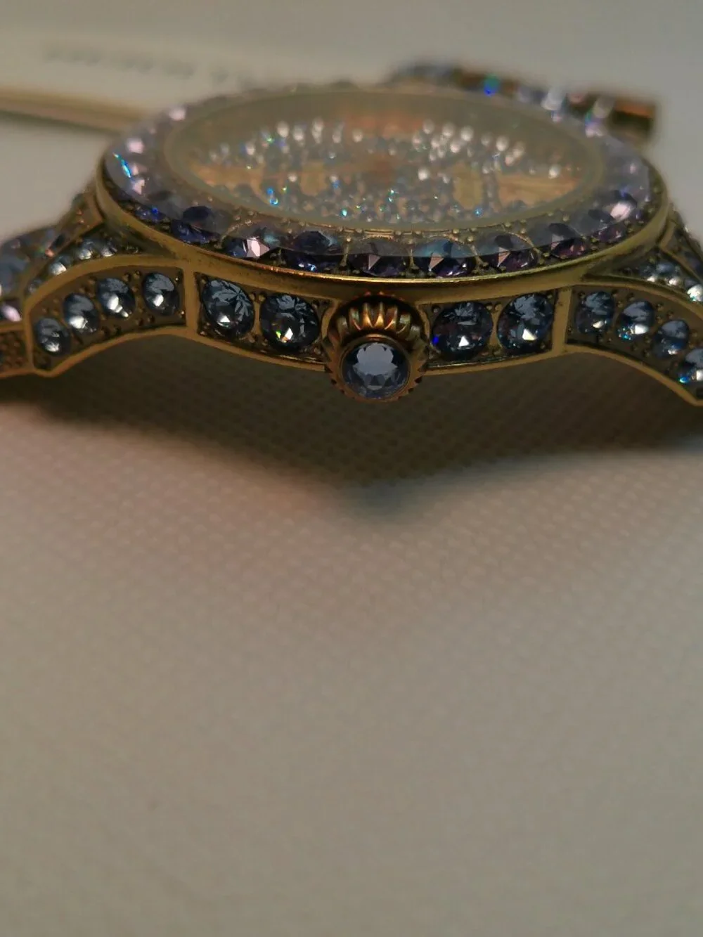 Heidi Daus quartz fashion watch bronze-tone covered with lavender-purple crystal